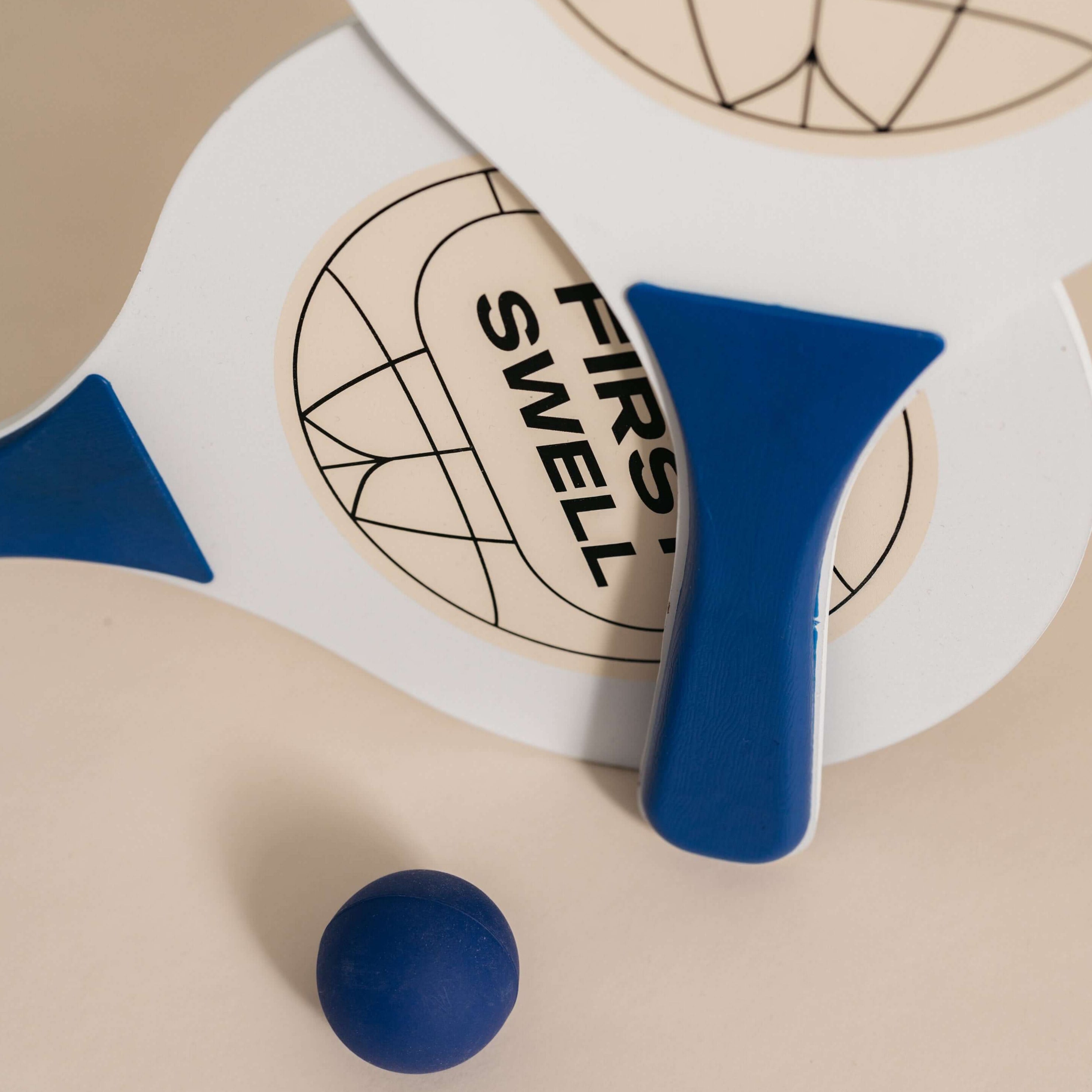 First Swell wood & pet paddles for hot summer days by the beach. Sustainable production.